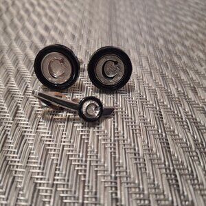 Silver tone cufflinks and tie clip engraved with letter C